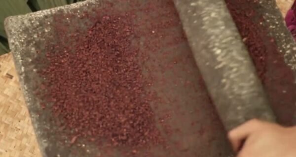 Ceremony cacao grinding